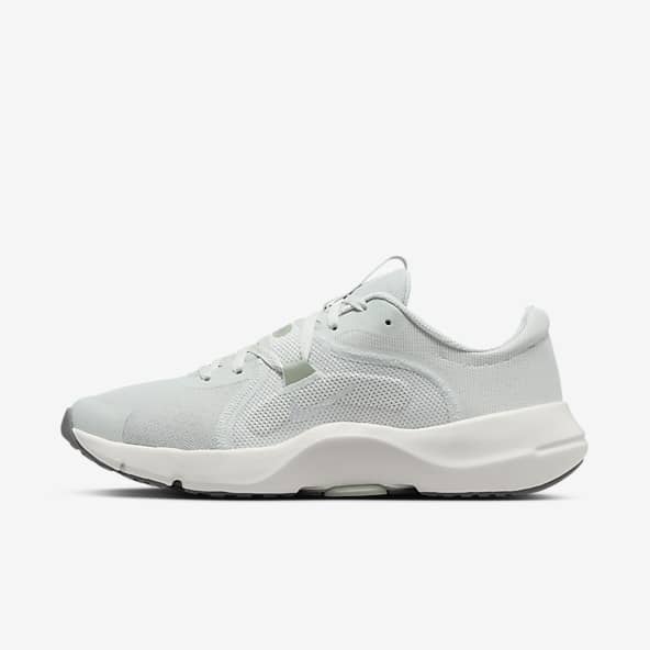 Tenis nike grises mujer on sale